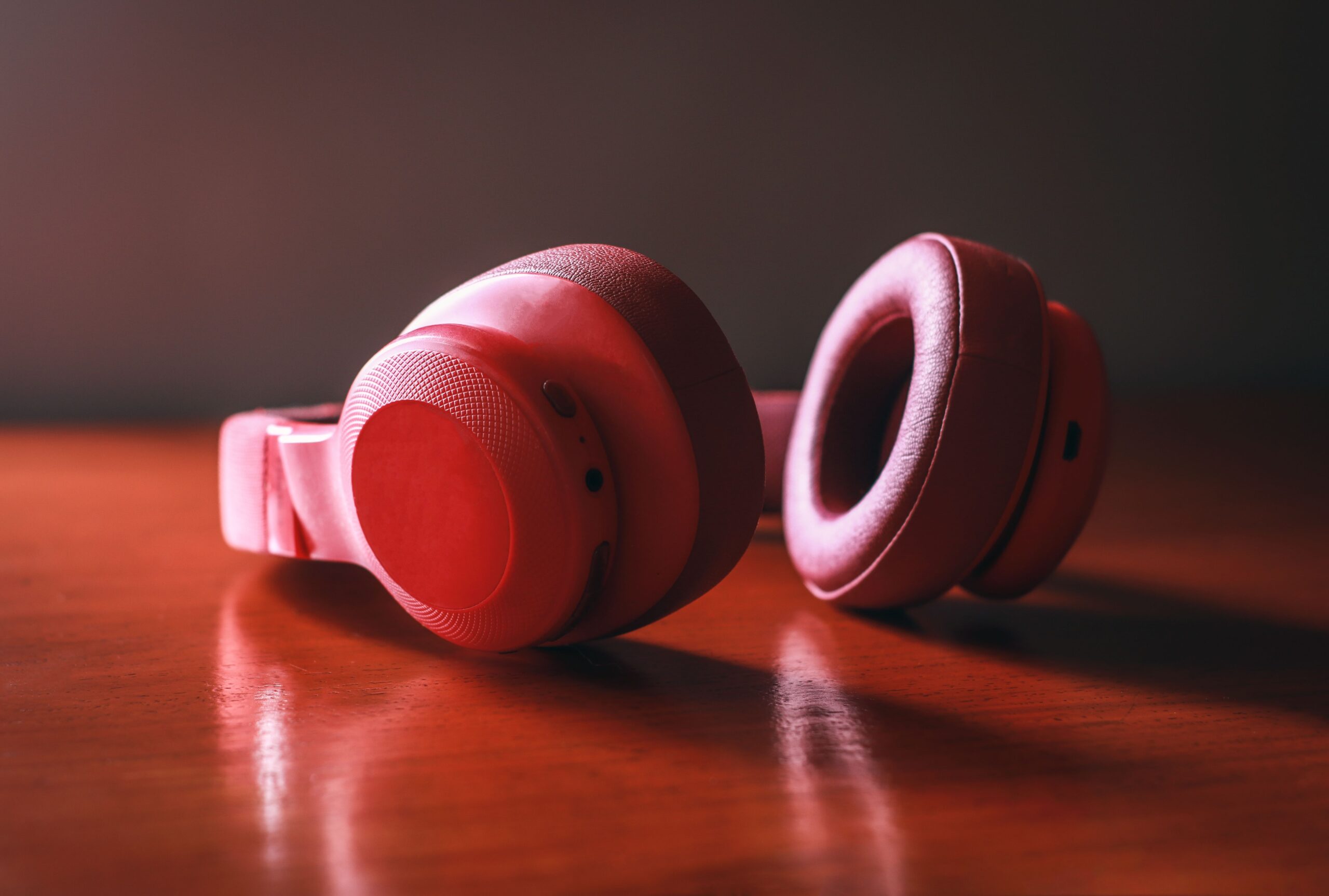 Wireless over-ear headphones on a table Wireless over-ear headphones on a table