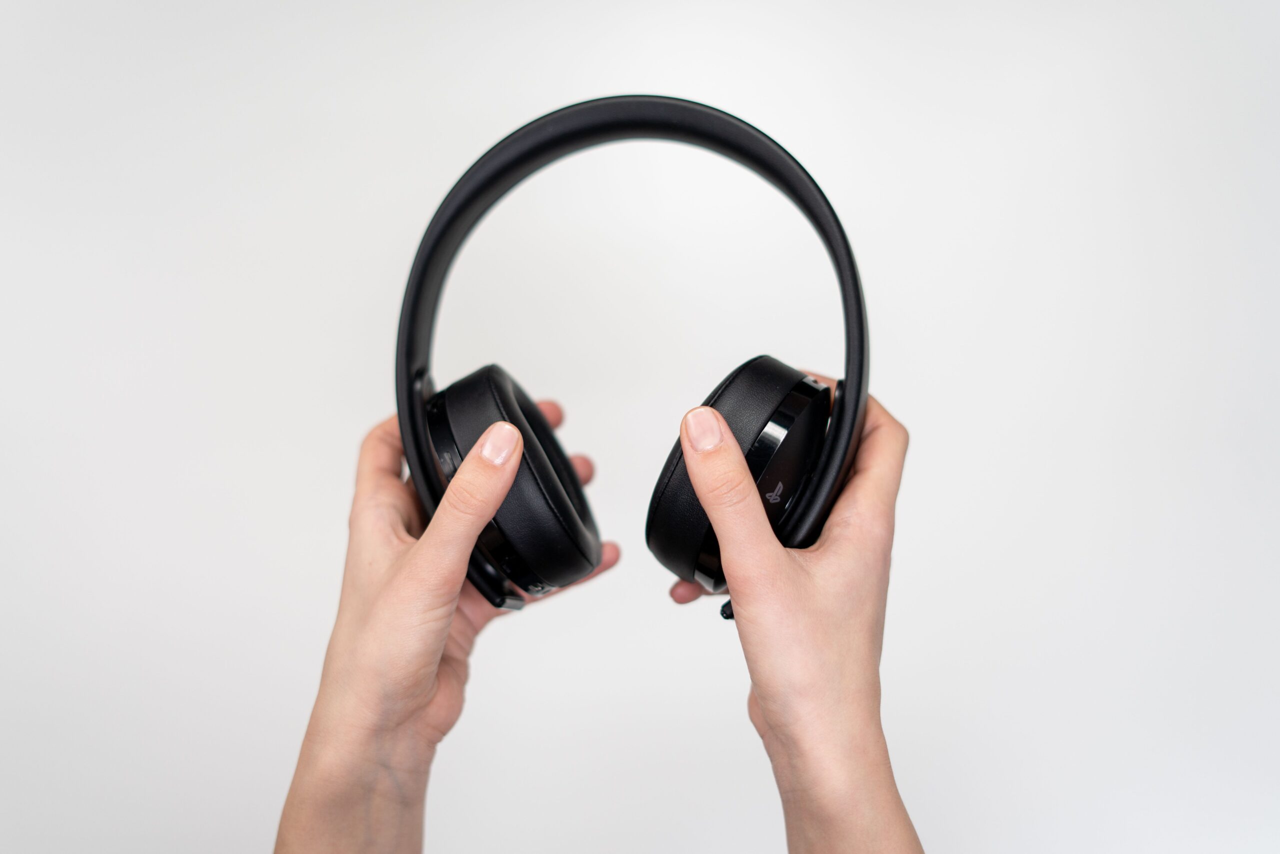 Wireless over-ear headphones on a table Wireless over-ear headphones on a table