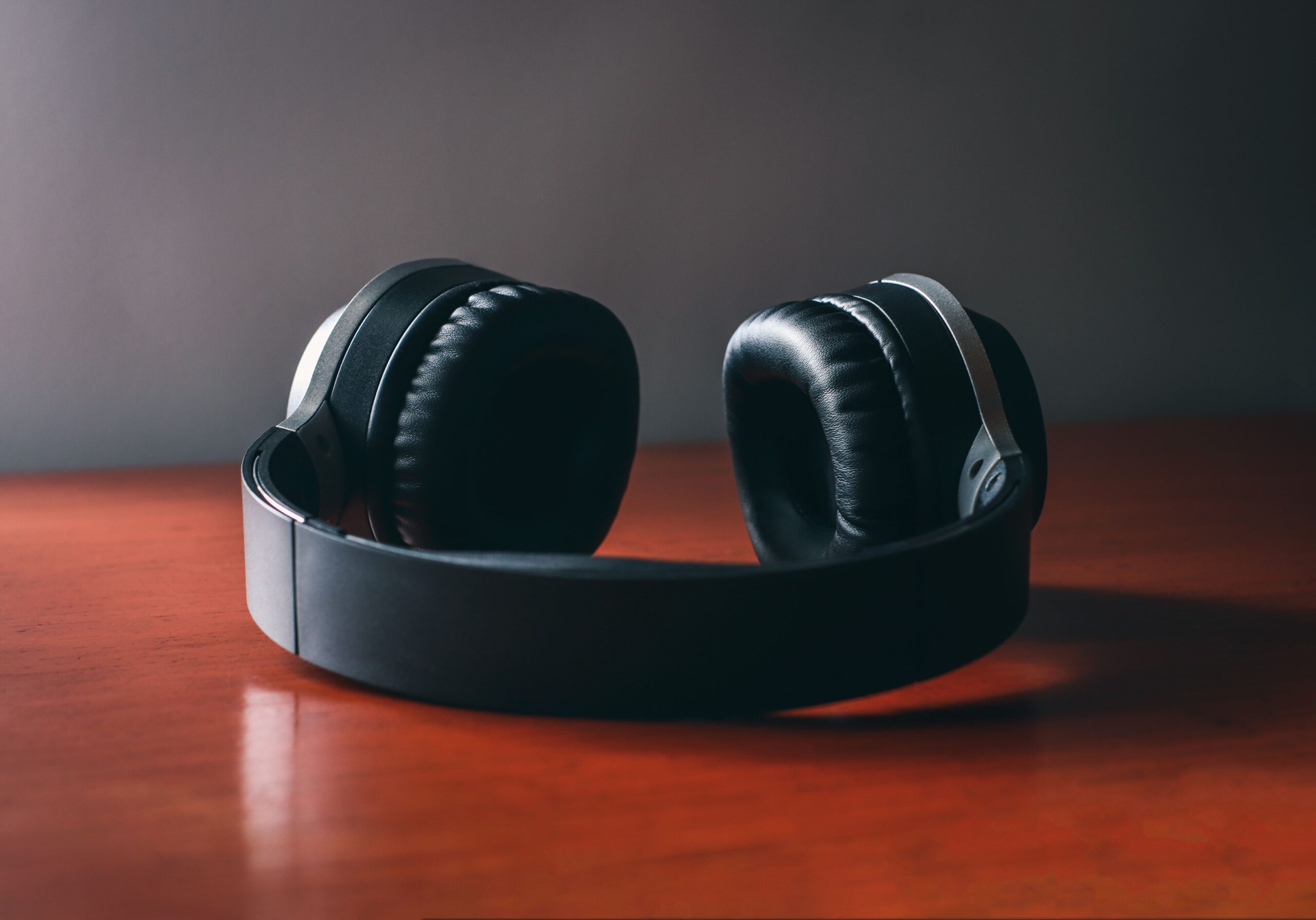 Over-ear wireless headphones being worn Over-ear wireless headphones being worn