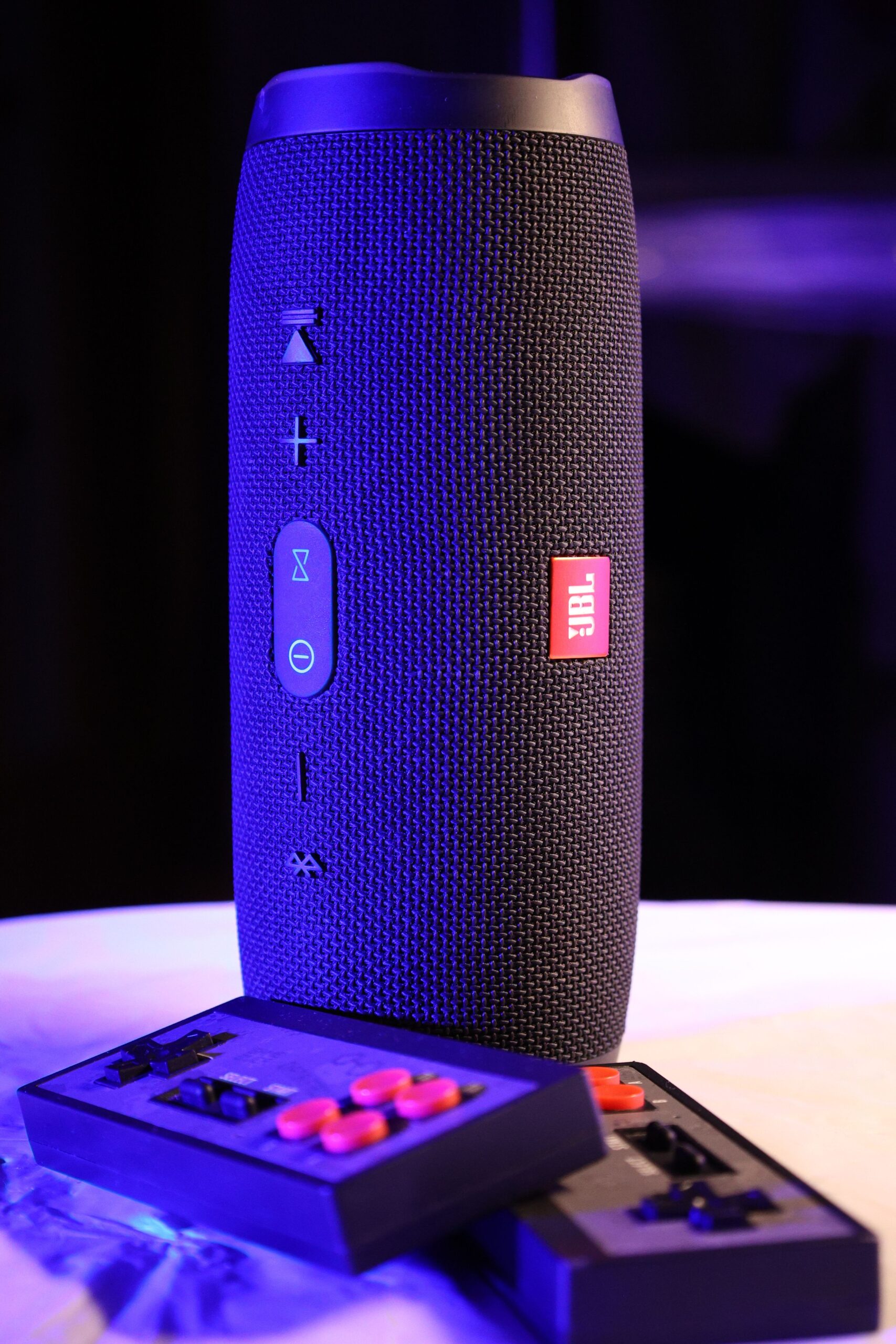 Bluetooth speaker on a desk Bluetooth speaker on a desk
