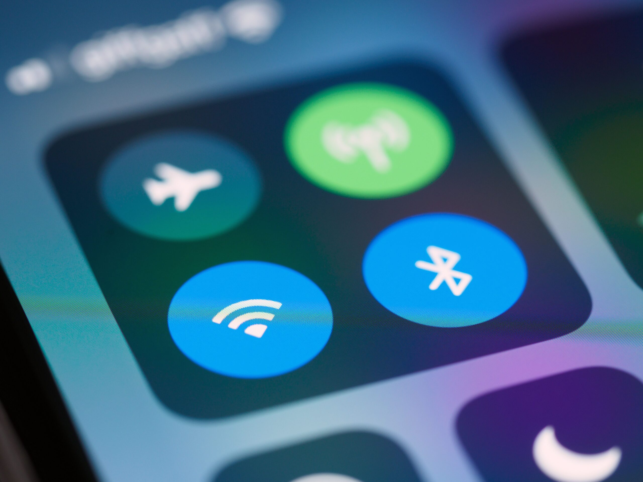 Close-up of a smartphone Bluetooth toggle icon used when pairing wireless earbuds Close-up of a smartphone Bluetooth toggle icon used when pairing wireless earbuds
