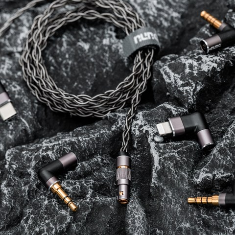DUNU DUW-02S cable coiled with swappable 3.5mm, USB-C, and Lightning plug options