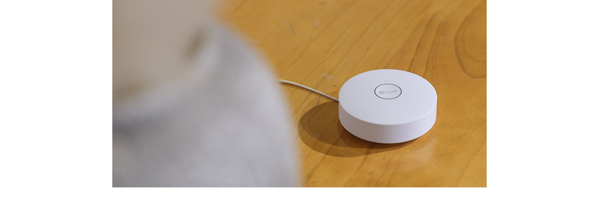 EZVIZ A3 Home Gateway placed on a table EZVIZ A3 Home Gateway placed on a table