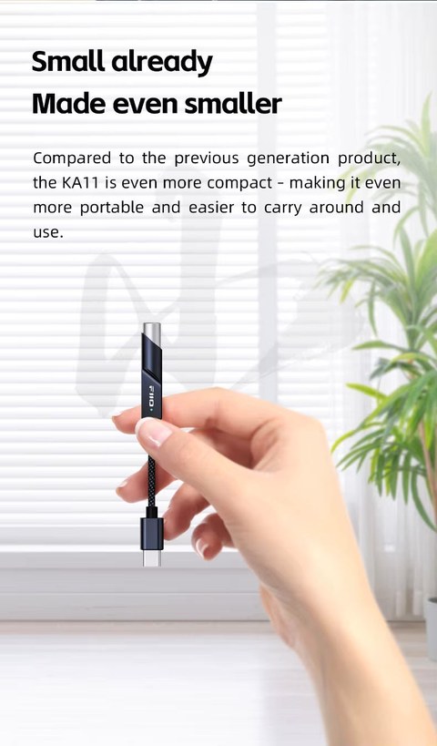 FiiO KA11 dongle DAC held in hand FiiO KA11 dongle DAC held in hand