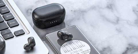 FiiO FW1 earbud charging case macro view FiiO FW1 earbud charging case macro view
