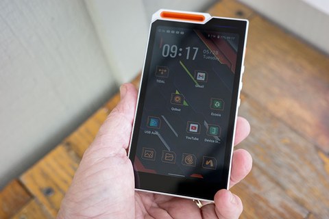 HiBy R4 digital audio player held in hand HiBy R4 digital audio player held in hand