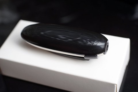 HiBy W5 Bluetooth receiver resting on its retail box HiBy W5 Bluetooth receiver resting on its retail box