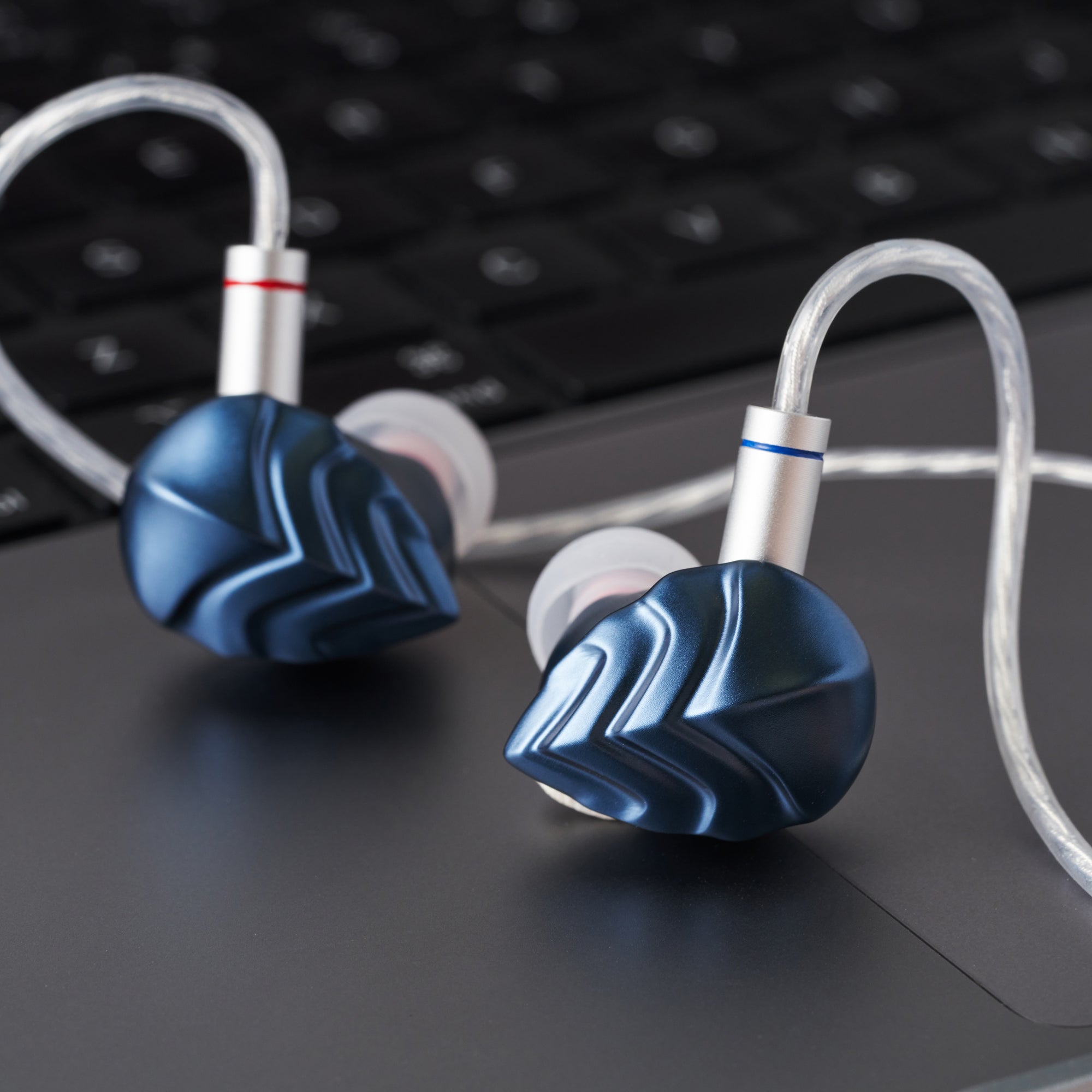 Close-up of the Hidizs MK12 Turris earphone shell and detachable cable connector