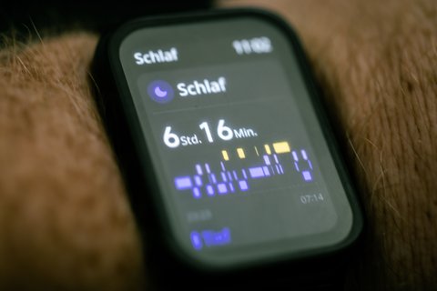 Close up of a smartwatch face showing the time Close up of a smartwatch face showing the time