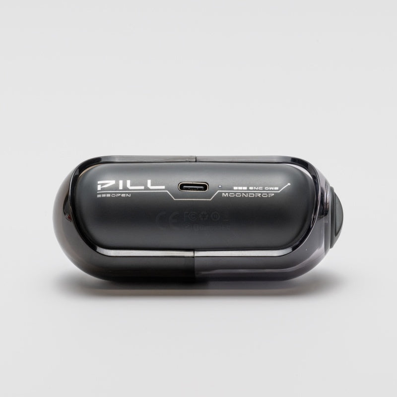 Moondrop Pill earbud showing USB-C charging port on case Moondrop Pill earbud showing USB-C charging port on case