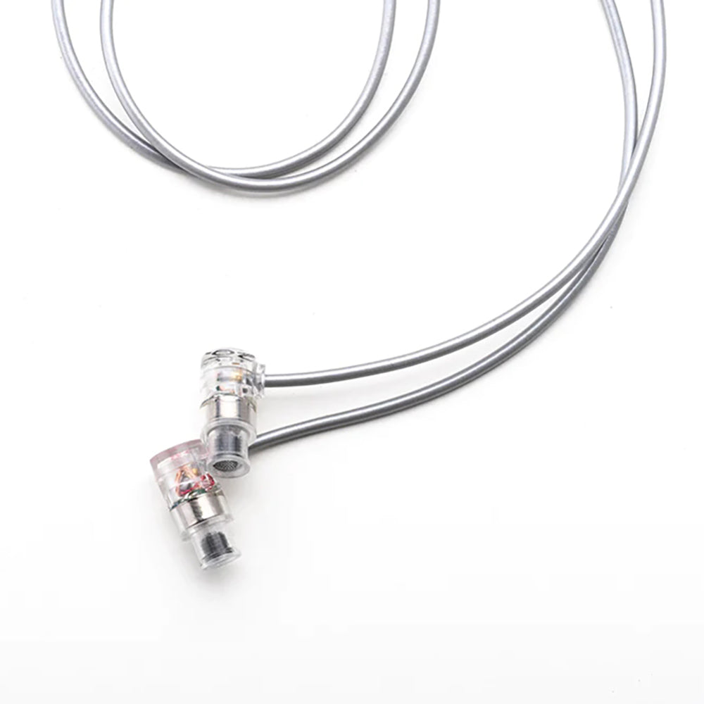 Moondrop Quarks earpieces with silver cable coiled on white background Moondrop Quarks earpieces with silver cable coiled on white background