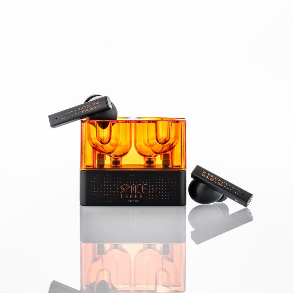 Moondrop Space Travel earbuds and charging case shown from the side with orange accent lighting Moondrop Space Travel earbuds and charging case shown from the side with orange accent lighting