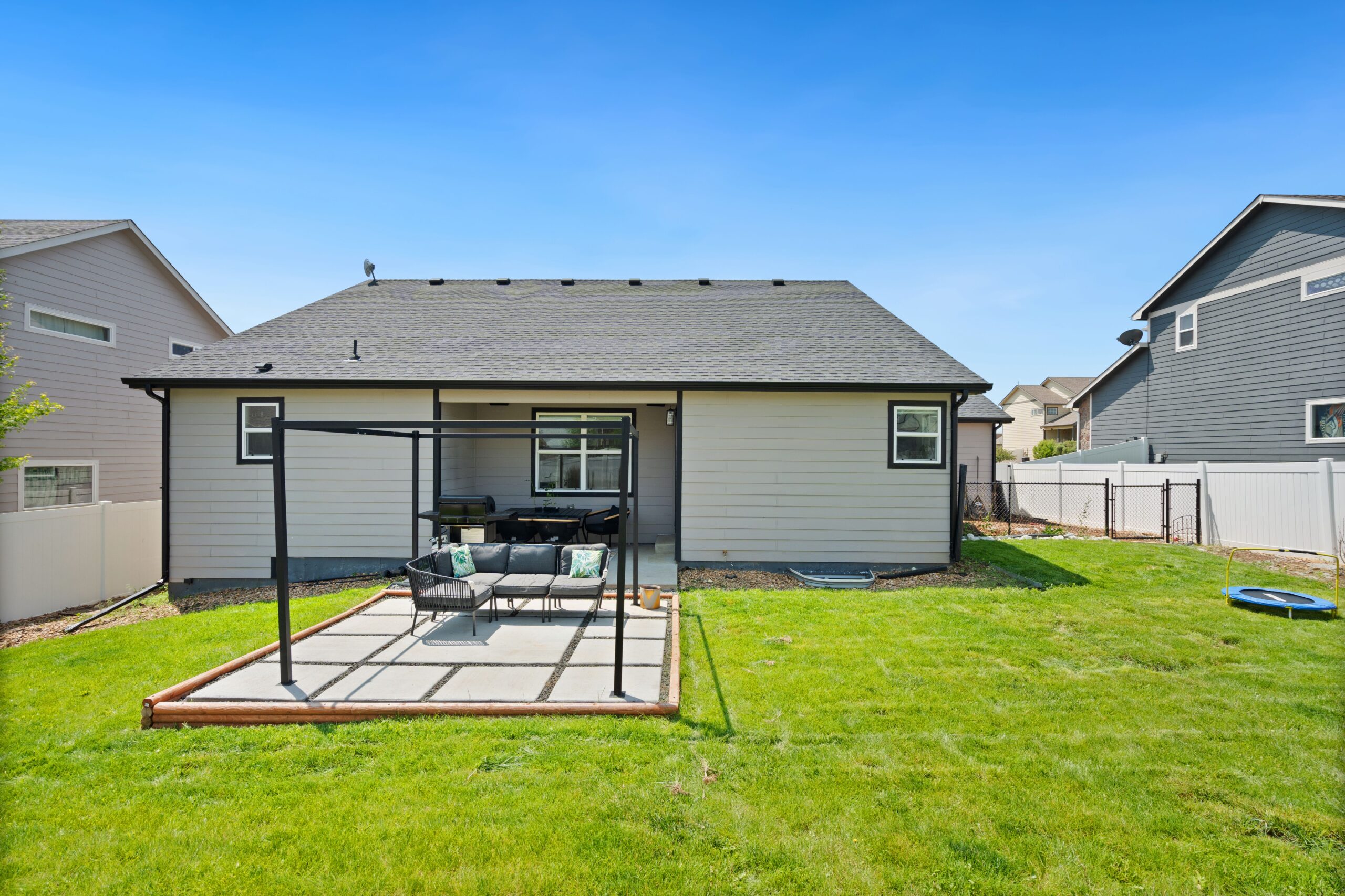House exterior and backyard patio, a typical outdoor camera install location House exterior and backyard patio, a typical outdoor camera install location