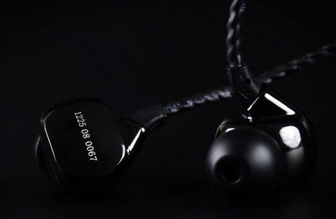 TFZ Balance 2 earpieces showing black braided cable and engraved shell text TFZ Balance 2 earpieces showing black braided cable and engraved shell text