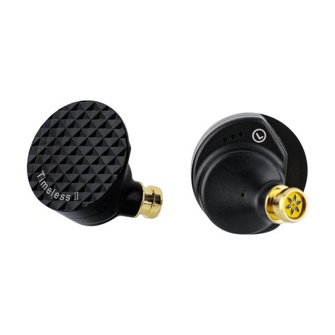 Timeless 2 earpiece resting near cable coil showing overall shell shape