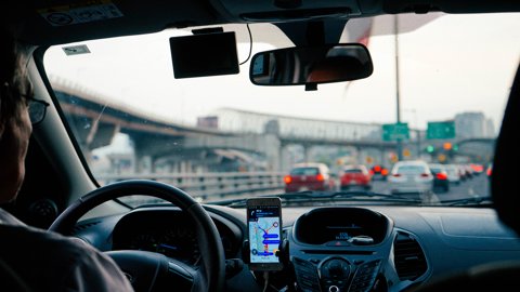 Driver view through windshield with dash cam mounted near rearview mirror Driver view through windshield with dash cam mounted near rearview mirror