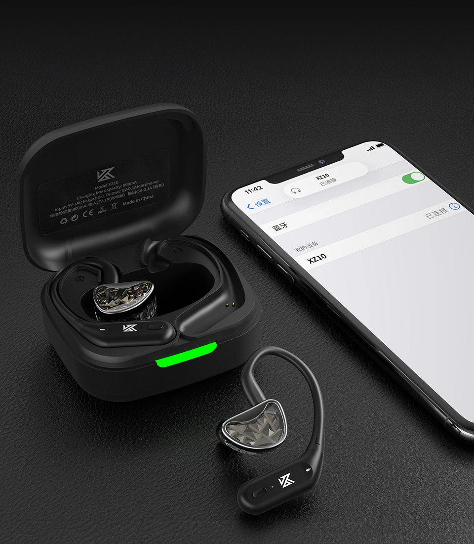 KZ XZ10 earhook module connected to an in-ear monitor next to a smartphone showing the Bluetooth connection KZ XZ10 earhook module connected to an in-ear monitor next to a smartphone showing the Bluetooth connection