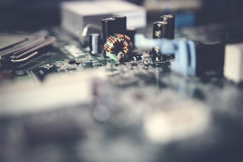 Close-up view of computer circuit board components similar to a vintage expansion card Close-up view of computer circuit board components similar to a vintage expansion card