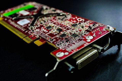 Older style PCI graphics card with DVI output representing a legacy Rage 128 install