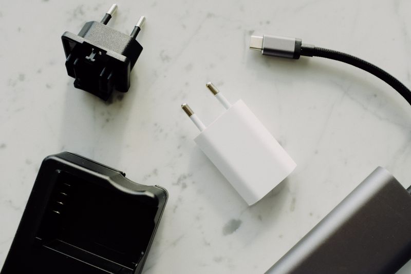 USB-C Thunderbolt cable and adapters on a desk USB-C Thunderbolt cable and adapters on a desk