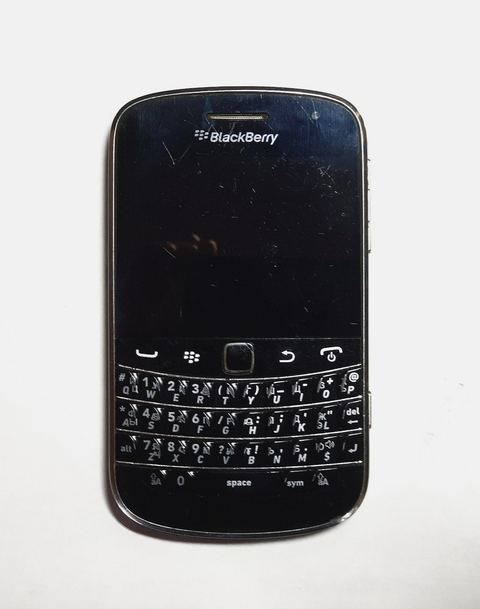 BlackBerry Bold smartphone connected with a USB cable BlackBerry Bold smartphone connected with a USB cable