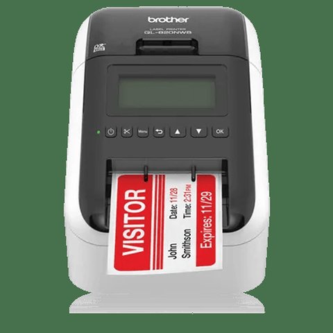 Brother QL-820NWB label printer with a red shipping label partially printed Brother QL-820NWB label printer with a red shipping label partially printed
