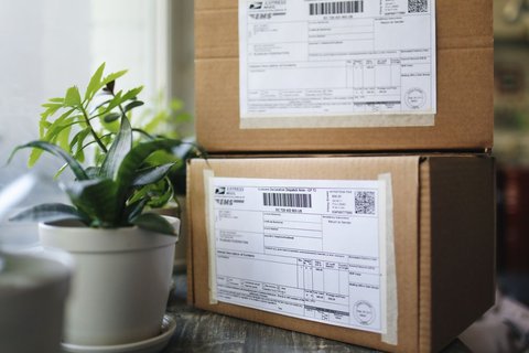 Shipping boxes with printed labels similar to output from a label printer Shipping boxes with printed labels similar to output from a label printer