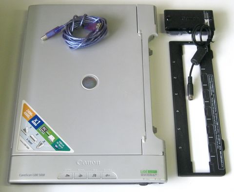 Canon CanoScan flatbed scanner similar in slim design to the LiDE series used for document scanning Canon CanoScan flatbed scanner similar in slim design to the LiDE series used for document scanning