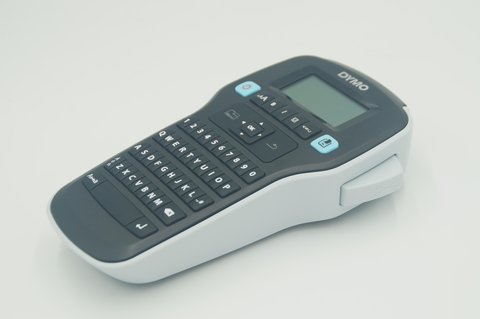 Dymo LabelManager 160 handheld label maker on white background