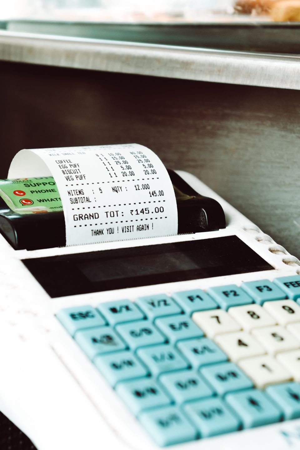 thermal receipt printer printing an itemized customer receipt thermal receipt printer printing an itemized customer receipt
