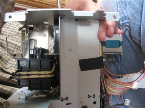 Internal mechanism of an inkjet printer showing print head and carriage rail Internal mechanism of an inkjet printer showing print head and carriage rail