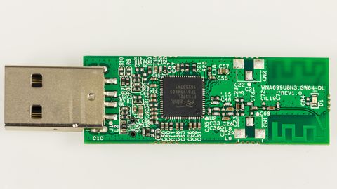 D-Link wireless adapter circuit board showing the wireless chipset component D-Link wireless adapter circuit board showing the wireless chipset component