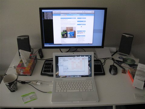 Gaming computer desk setup with monitor and PC tower running graphics workload Gaming computer desk setup with monitor and PC tower running graphics workload