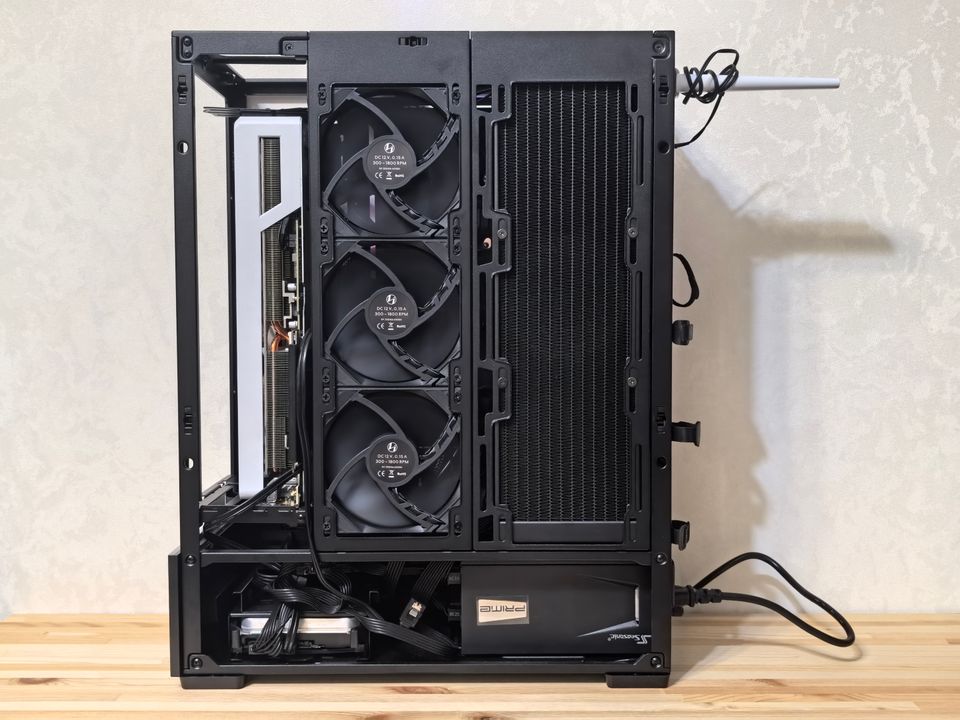 Inside view of a desktop PC case showing expansion card slots and cooling fans Inside view of a desktop PC case showing expansion card slots and cooling fans