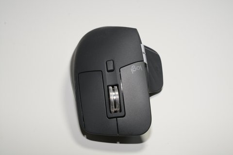 Logitech MX Master 3S wireless mouse shown from the side with logo Logitech MX Master 3S wireless mouse shown from the side with logo