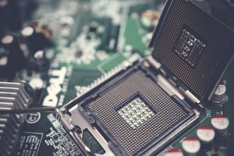 Open CPU socket on a desktop PC motherboard Open CPU socket on a desktop PC motherboard