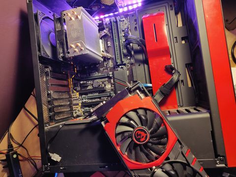 Inside a desktop computer case showing an installed MSI graphics card Inside a desktop computer case showing an installed MSI graphics card