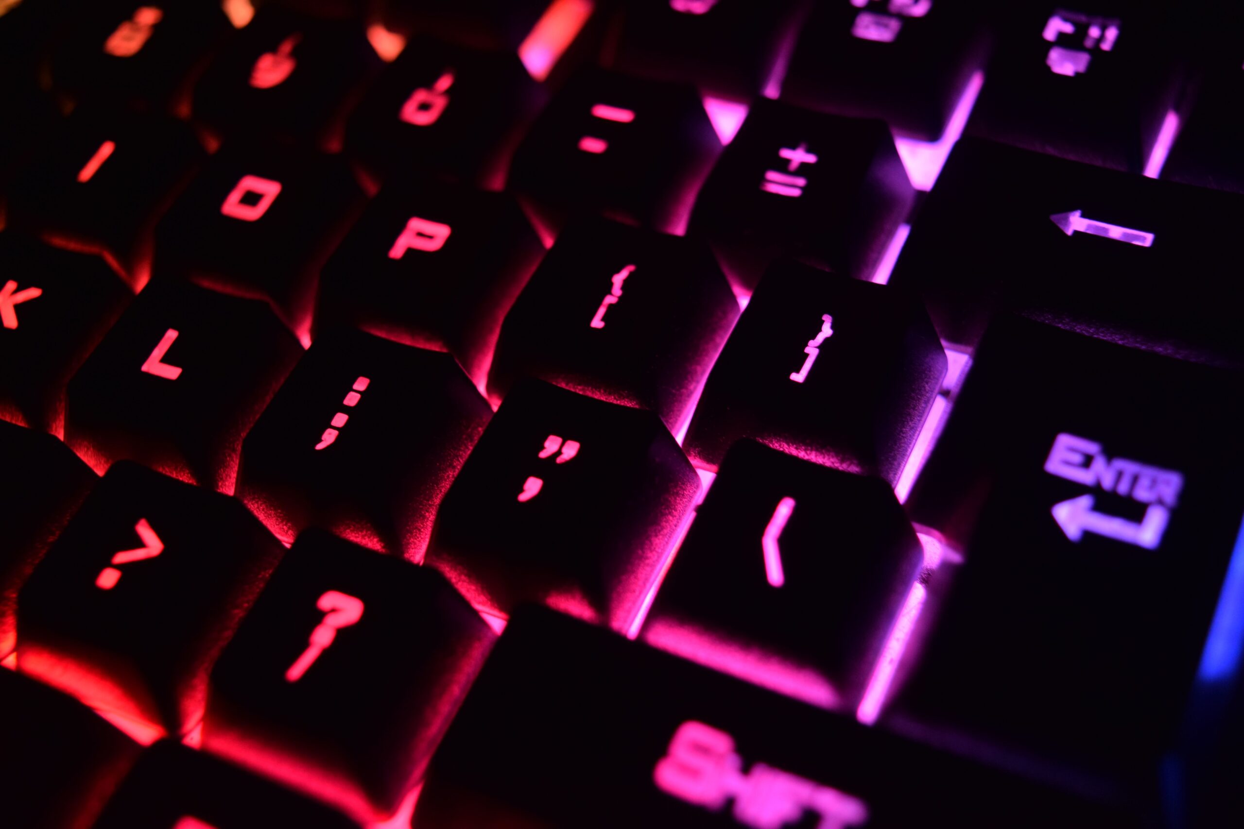 Close-up of a mechanical keyboard with RGB backlit keys Close-up of a mechanical keyboard with RGB backlit keys