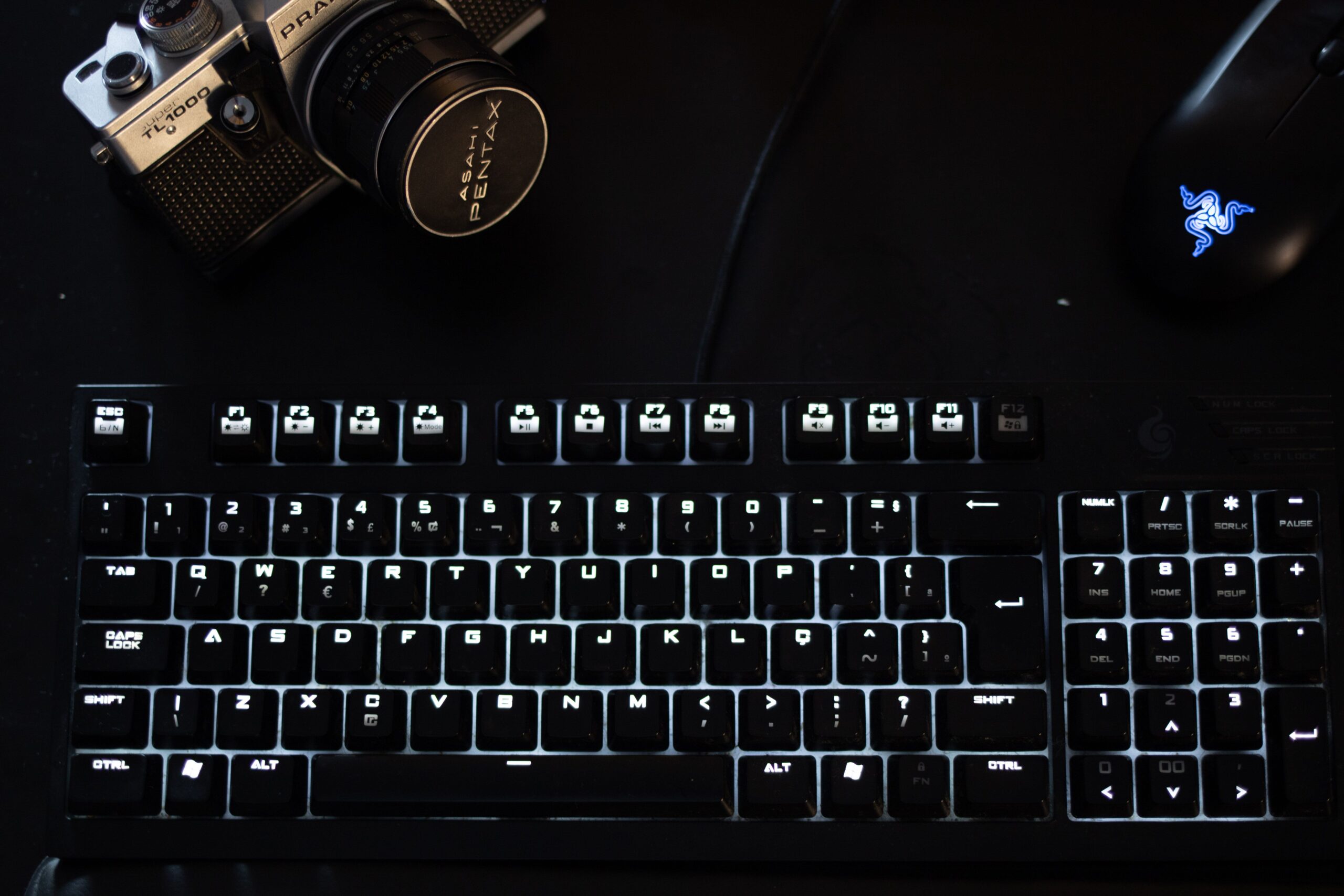 Illuminated mechanical keyboard switches glowing at night Illuminated mechanical keyboard switches glowing at night