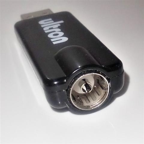TV antenna connector plugged into USB tuner TV antenna connector plugged into USB tuner