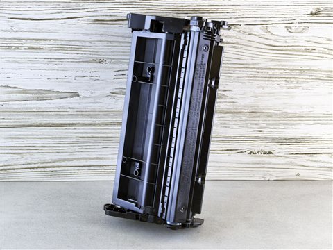 Laser printer toner cartridge removed for inspection during maintenance troubleshooting Laser printer toner cartridge removed for inspection during maintenance troubleshooting