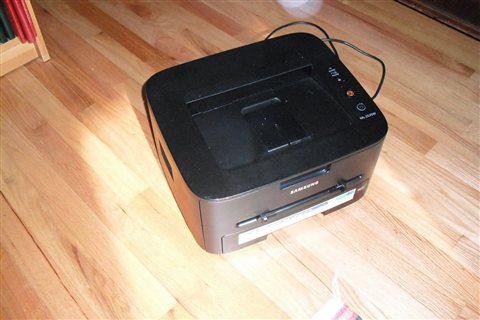 Compact monochrome laser printer used for wireless home office printing