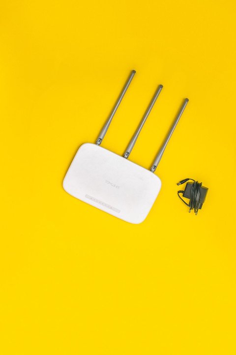 wireless router with antennas used to connect a home inkjet printer wireless router with antennas used to connect a home inkjet printer