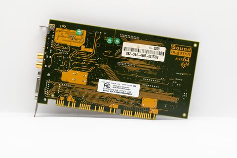 Rear bracket of a PCI sound card with gold plated audio jacks Rear bracket of a PCI sound card with gold plated audio jacks