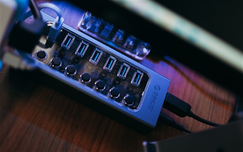 Close-up of USB ports on a hub used to connect peripherals like a webcam