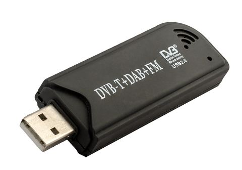 Compact USB television tuner stick plugged into a laptop Compact USB television tuner stick plugged into a laptop