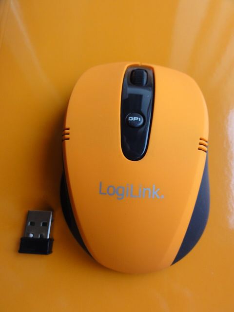small USB wireless receiver dongle used to connect a computer mouse small USB wireless receiver dongle used to connect a computer mouse