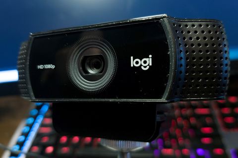 Logitech HD Webcam C310 clipped onto a laptop monitor