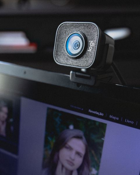 USB webcam clipped to the top of a laptop display USB webcam clipped to the top of a laptop display