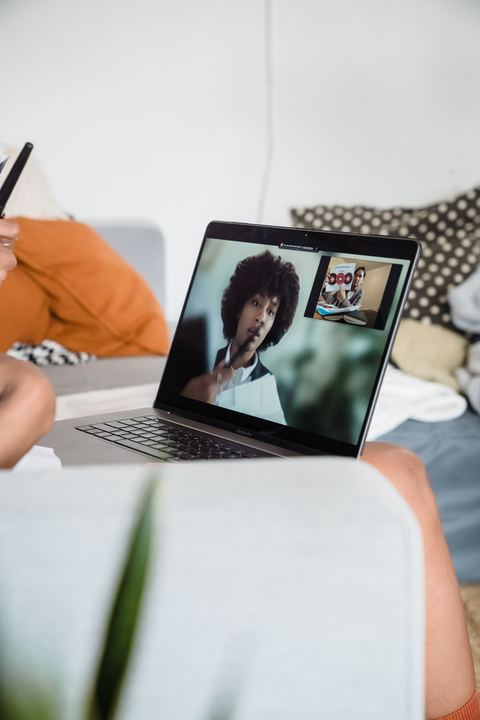 Person on a video call using a laptop built in camera Person on a video call using a laptop built in camera